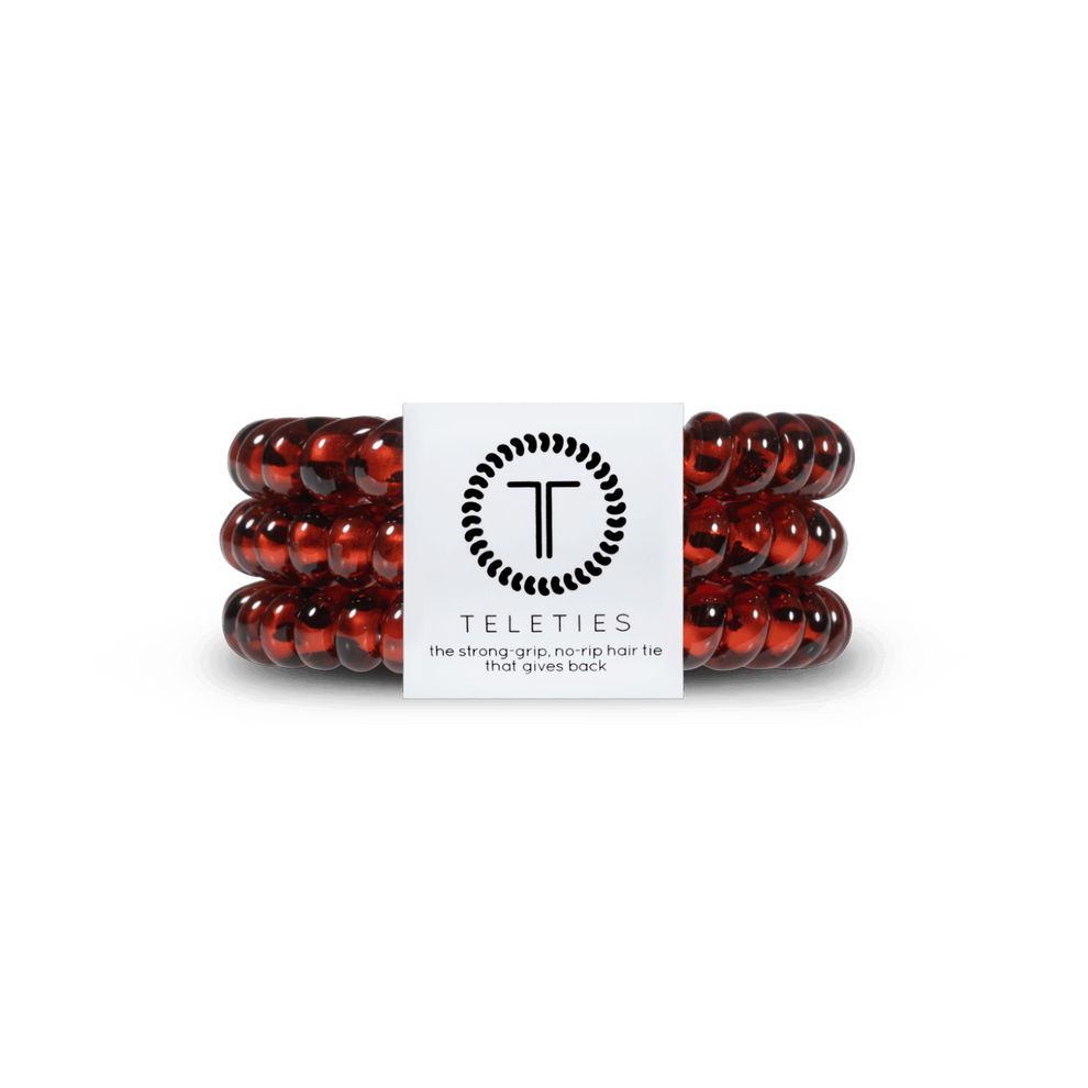 TELETIES Tortoise Small Hair Ties in a neutral, translucent deep brown color. Pack of 3 spiral hair ties with a strong grip with no breakage.
