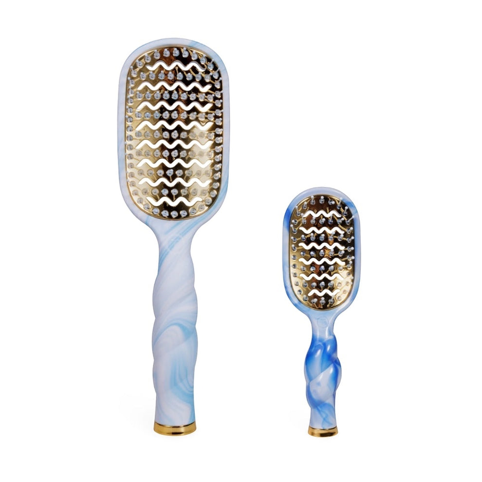 TELETIES blue and white marbled vented hair brushes with gold accents. Set of two.

