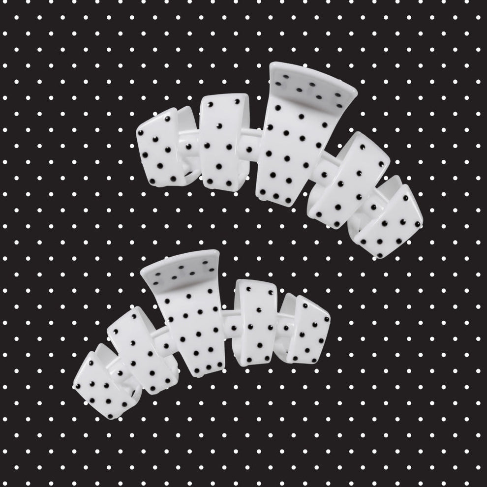 TELETIES medium claw clips in white with a black polka dot pattern made of nylon material to provide a secure and safer wear.
