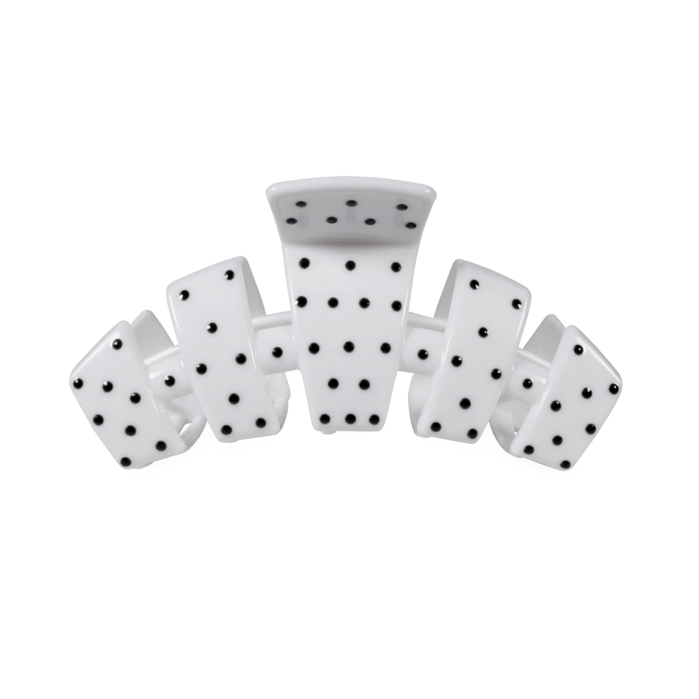 TELETIES medium claw clip in white with a black polka dot pattern, featuring a curved design for secure hair styling.
