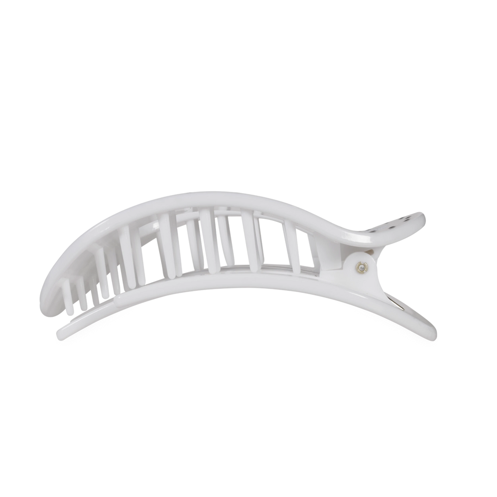 TELETIES large white flat hair clip with black polka dots, designed for comfortable wear against headrests.

