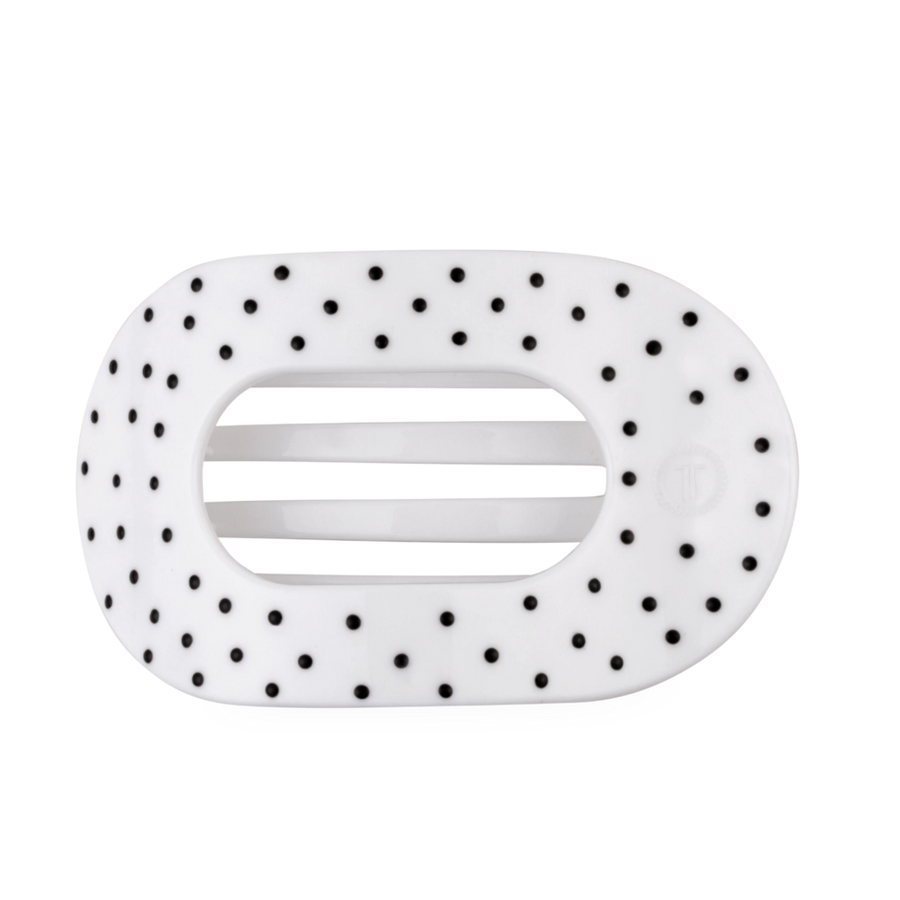 TELETIES large flat round hair clip in white with a black polka dot pattern for comfortable wear against headrests.

